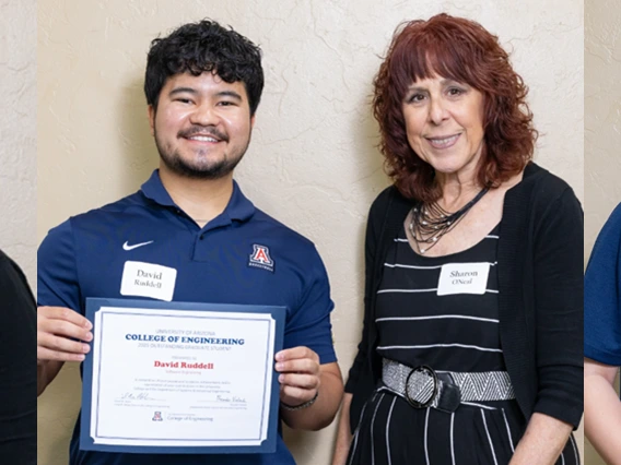 Software engineering students and teaching assistants pose for a picture at the end-of-semester awards celebration