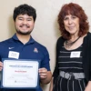Software engineering students and teaching assistants pose for a picture at the end-of-semester awards celebration
